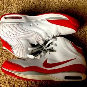 One pair of white and red Nike elite